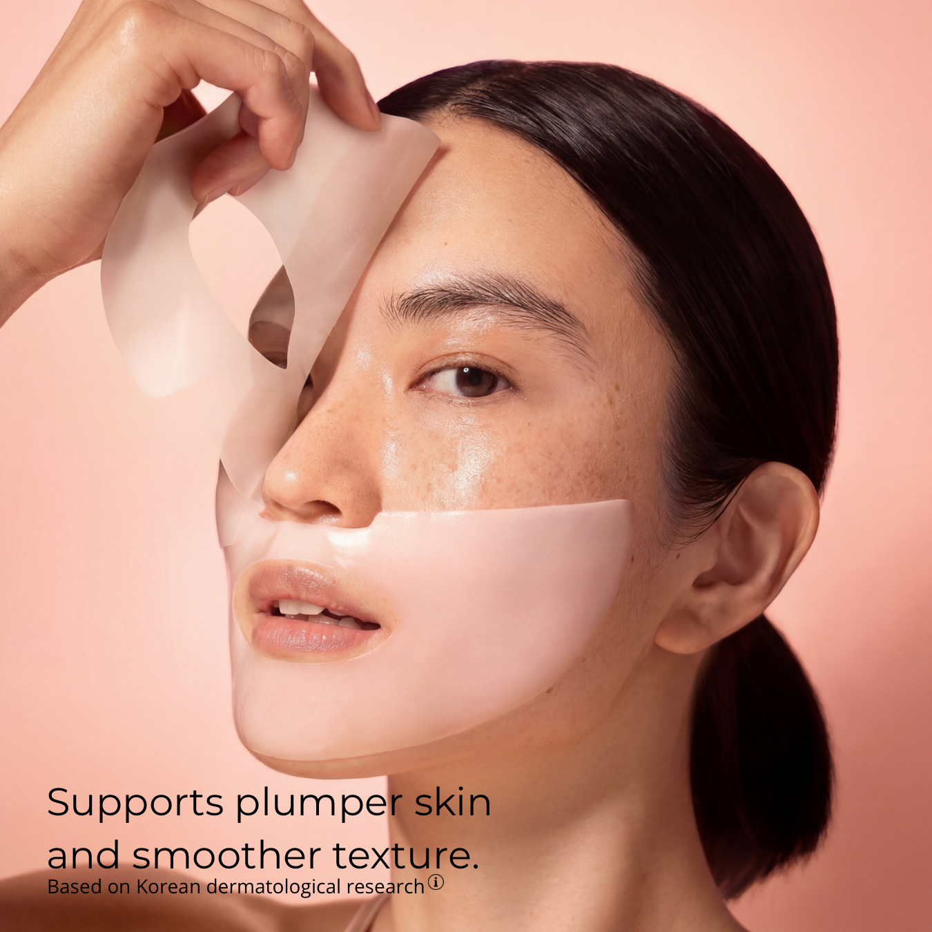 Woman using a skincare product with text on a pink background